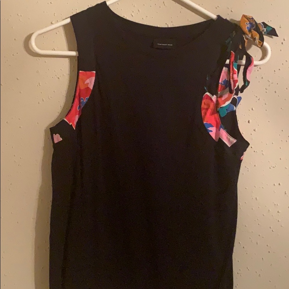Black tank with hints of floral on neck line